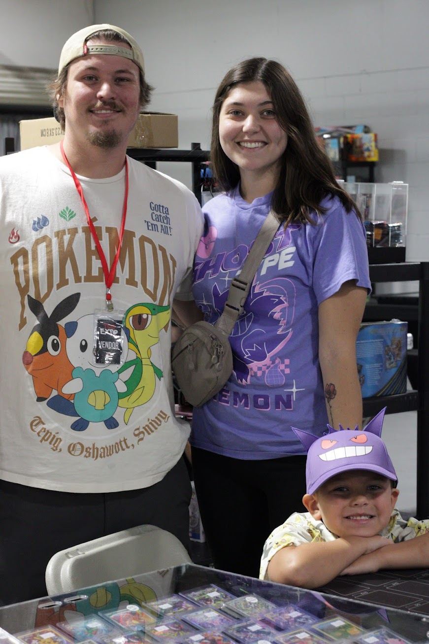 A family in Pokemon shirts at the expo