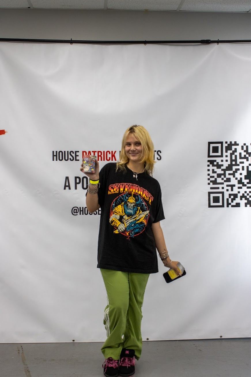 Giveaway winner at the House Patrick backdrop