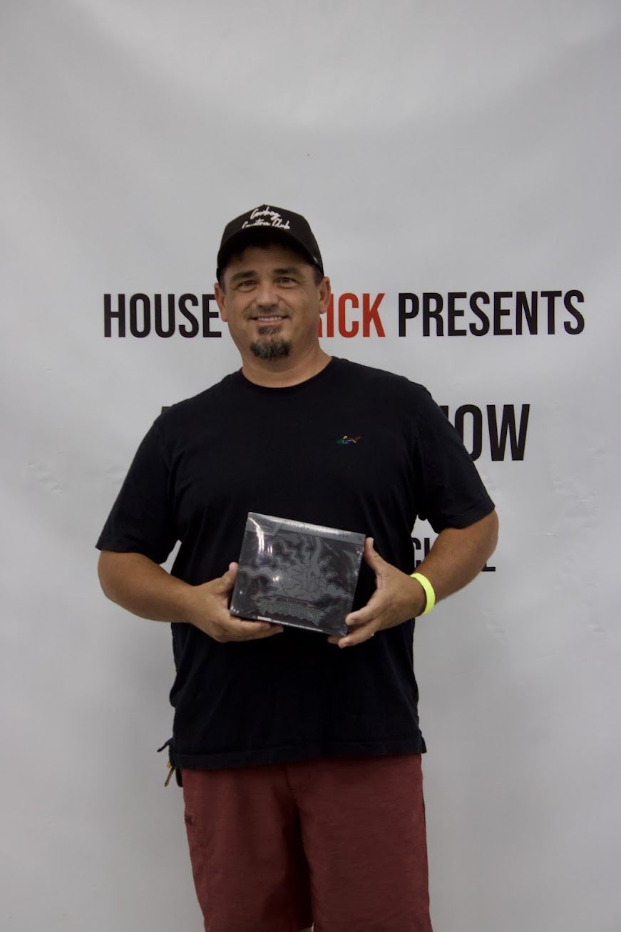 Giveaway winner with a sealed prize box