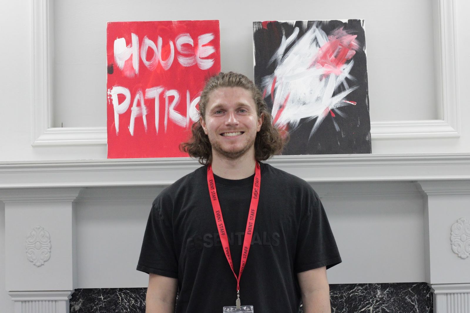 Hunter Gowin in front of the House Patrick paintings